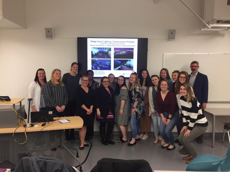 Interior Architecture and Design students and their presentation to design lighting, furniture, and interactive games to enliven Wings Court, a park space in New Bedford. Photo courtesy: UMass Dartmouth